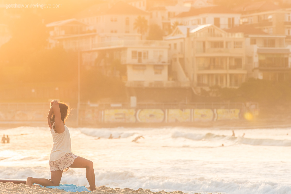 Bondi Beach Yoga. Woman at sunrise
