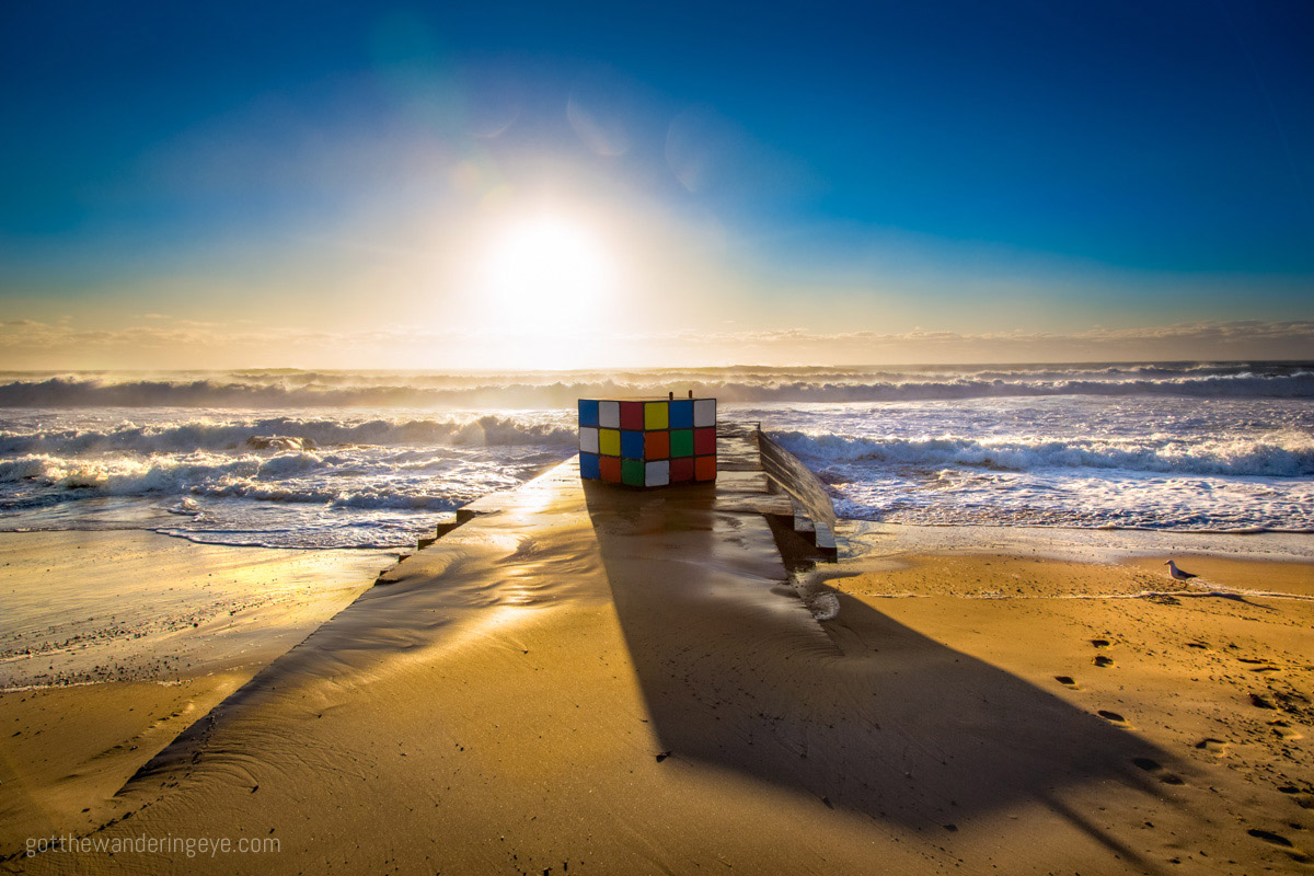 Sunrise over the Big Rubiks Cube sculpture Maroubra Beach.