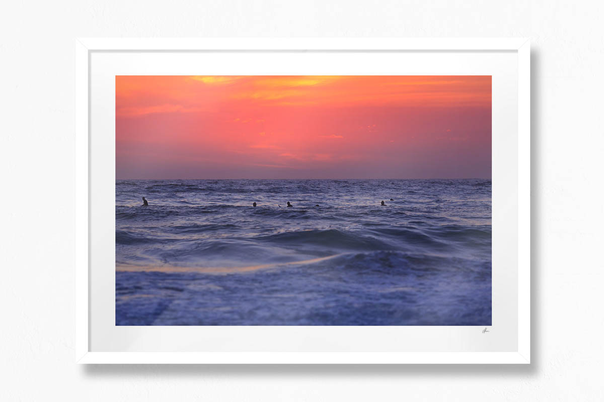 Surfers waiting for Beach Sunrise.