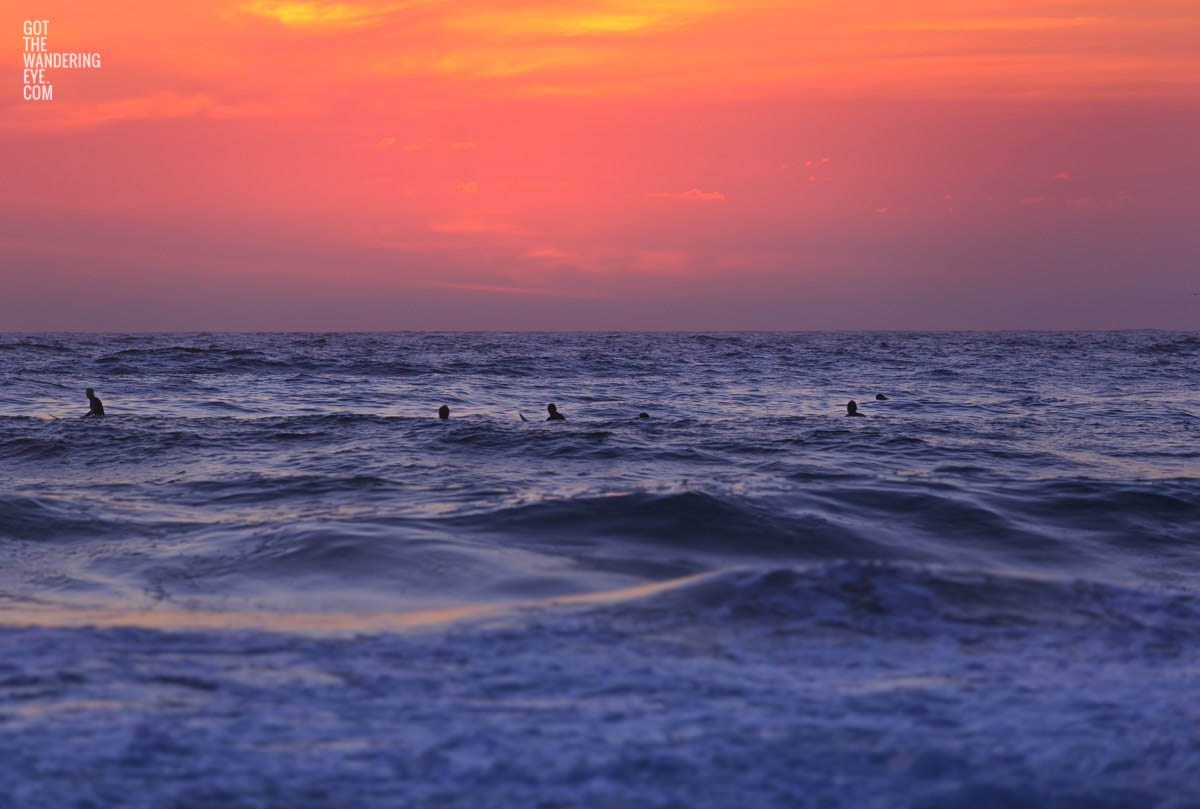 Surfers waiting for Beach Sunrise.