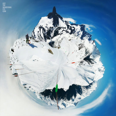 Little Planet Tiny Globe of Snowboarder in Whistler looking at Black Tusk