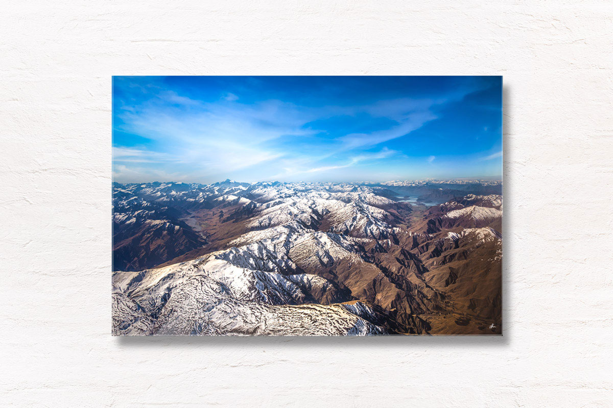 New Zealand Mountains Aerial blue skies surrounded by mountain peaks