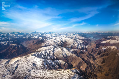 New Zealand Mountains Aerial blue skies surrounded by mountain peaks