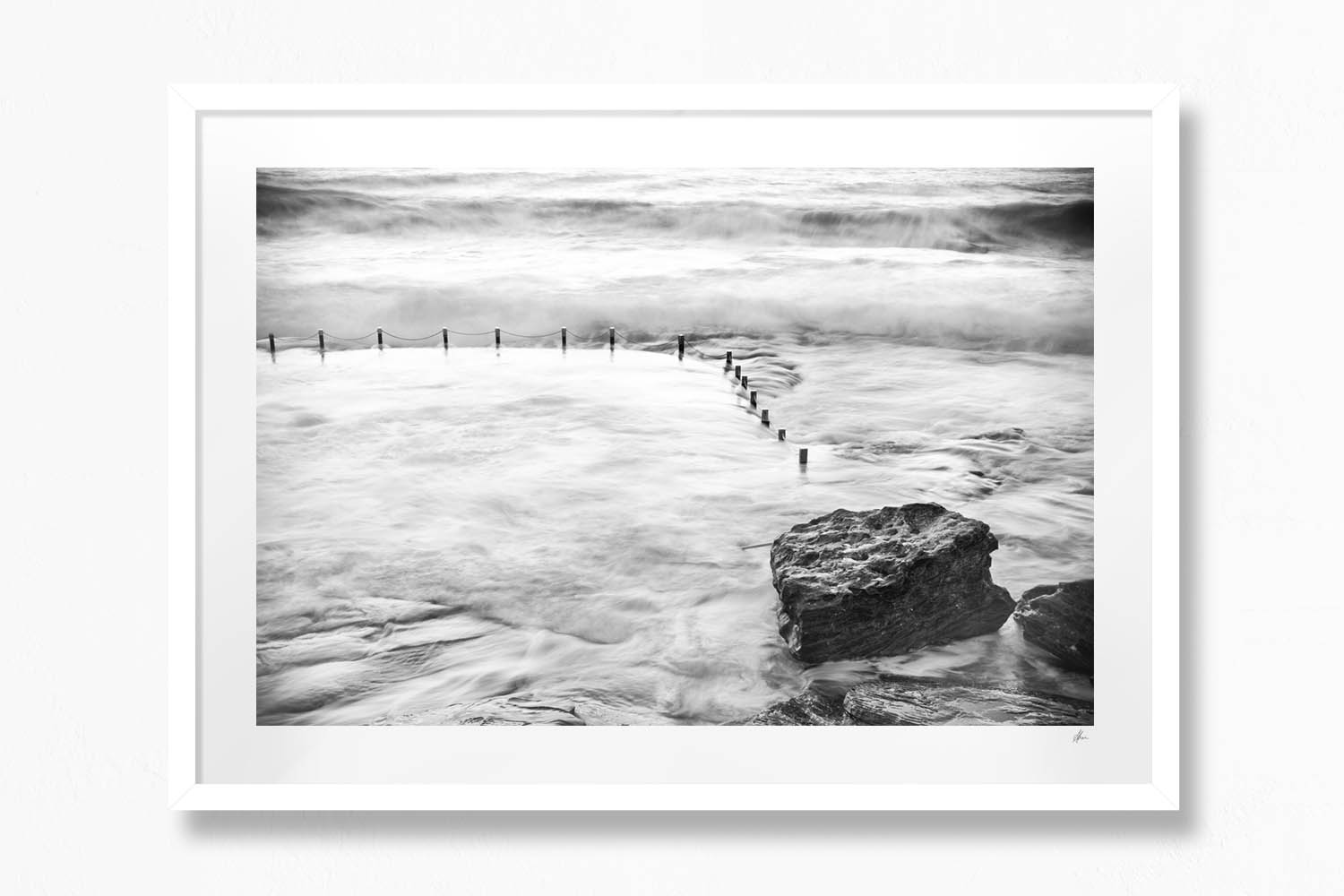 Black & White Long Exposure with big waves crashing over Mahon Pool, Maroubra