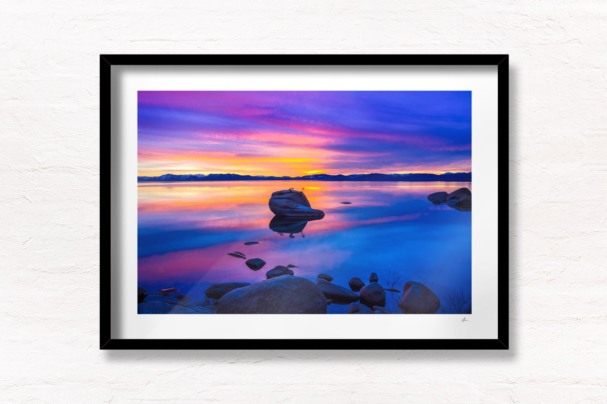 Sunset at Bonsai Rock. Purple sky reflection on Lake Tahoe