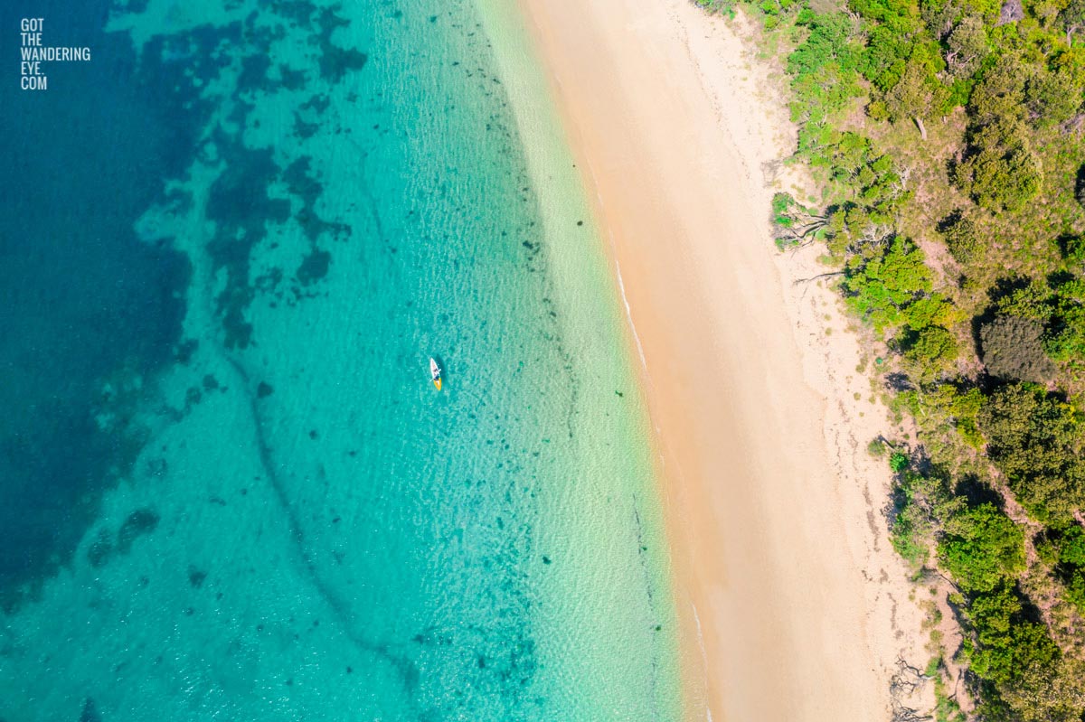 Aerial above secluded beach. Kayaking South Coast NSW