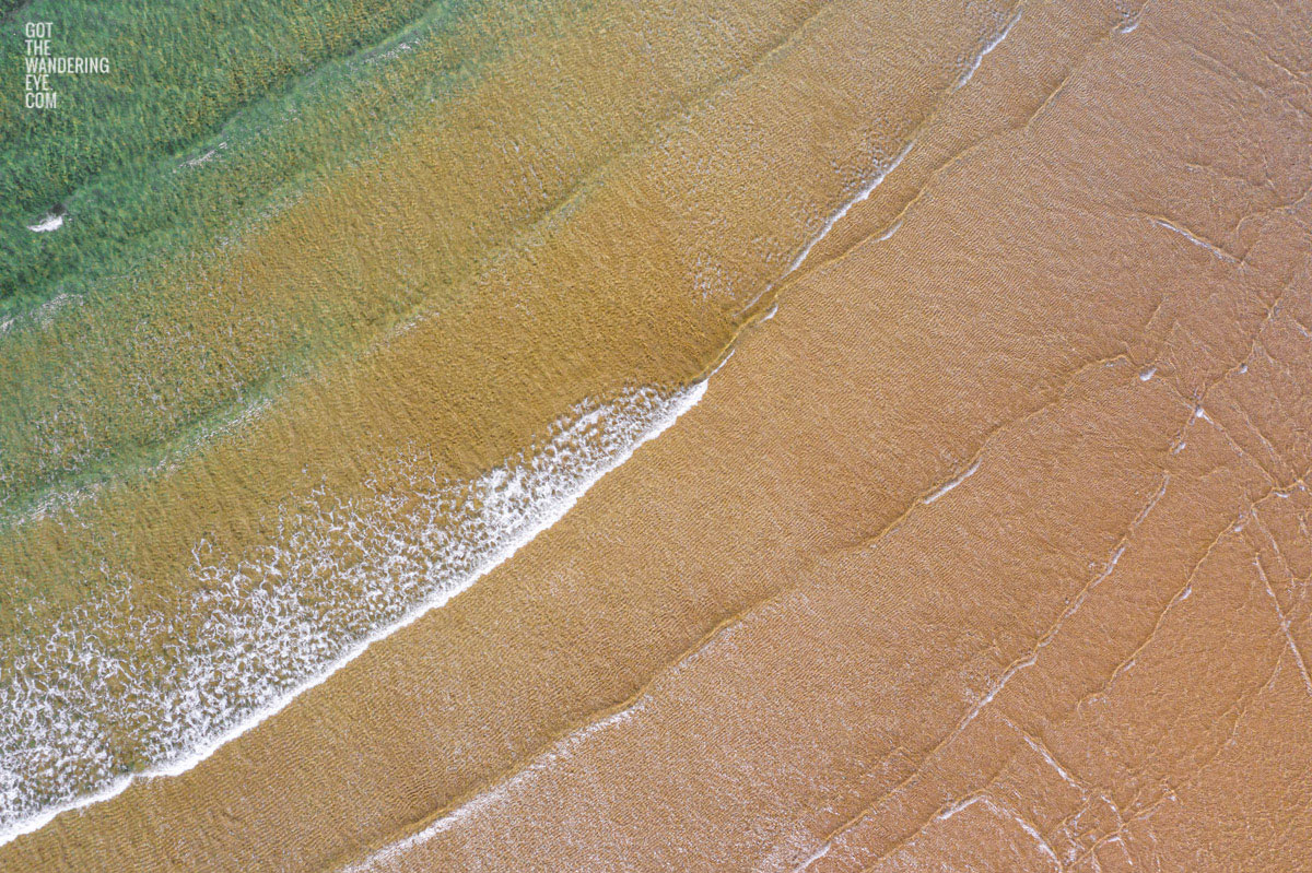 Aerial, oceanscape of endless waves in the South Coast of NSW
