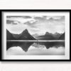 Milford Sound New Zealand. Reflection of woman and mountains at sunset.
