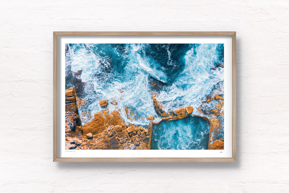 Aerial seascape above an empty icy cold Mahon Pool, Maroubra