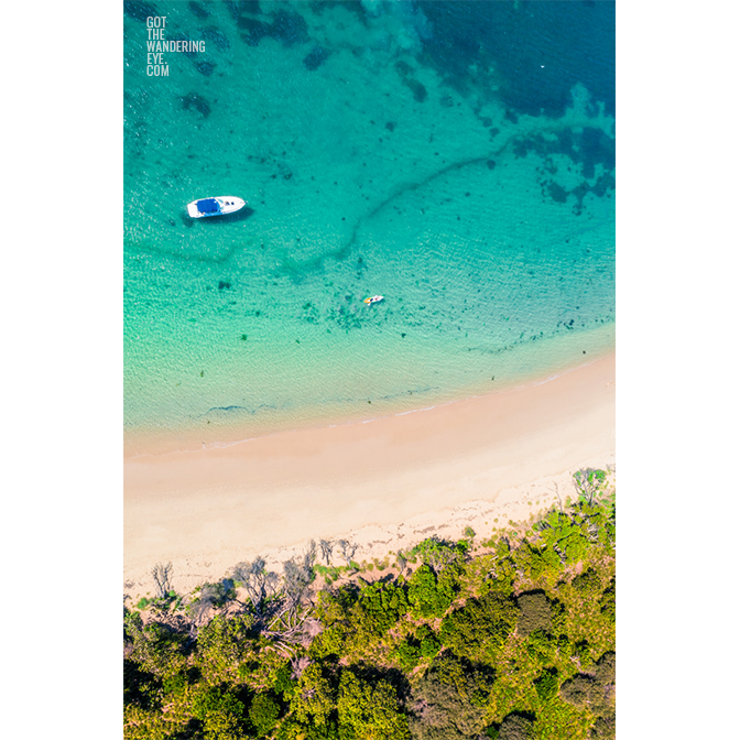 Aerial oceanscape overlooking Jibbon Beach in the South Coast of NSW