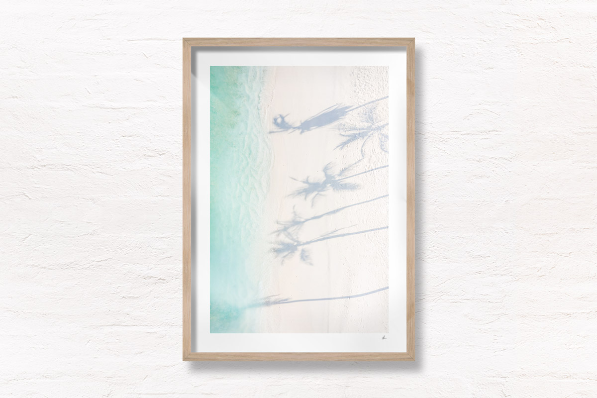 Tropical Palm Tree Shadow on Maldives white sand beach.