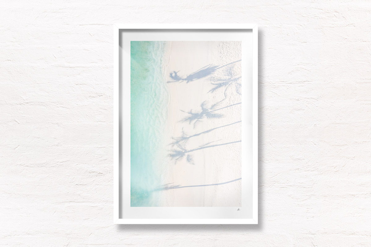 Tropical Palm Tree Shadow on Maldives white sand beach.
