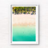 Aerial oceanscape overlooking a kayaker paddling to the beautiful South Coast's Jibbon Beach