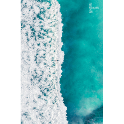 Surfing Maroubra Beach. Man on the crest of wave at the famous surfing beach.