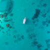 Maldives Ocean. Aerial view above anchored boat in the Maldives