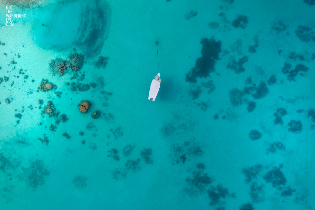 Maldives Ocean. Aerial view above anchored boat in the Maldives