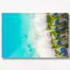 Luxury Escapes Maldives. Aerial seascape above beautiful Maldives Beach.