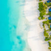 Luxury Escapes Maldives. Aerial seascape above beautiful Maldives Beach.