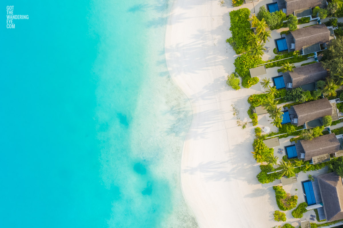 Luxury Escapes Maldives. Aerial seascape above beautiful Maldives Beach.