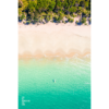 Aerial oceanscape overlooking a kayaker paddling to the beautiful South Coast's Jibbon Beach