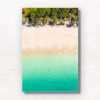 Aerial oceanscape overlooking a kayaker paddling to the beautiful South Coast's Jibbon Beach