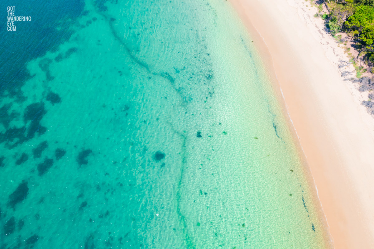 Aerial view of crystal clear beach South Coast NSW