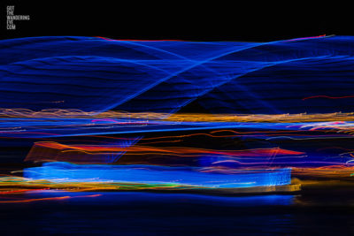 Long exposure, light painting photography of Vivid Festival. Light trails of Sydney Harbour Bridge, Australia