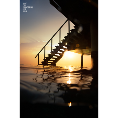 Ocean Sunrise from underneath an over water bungalow in the Maldives