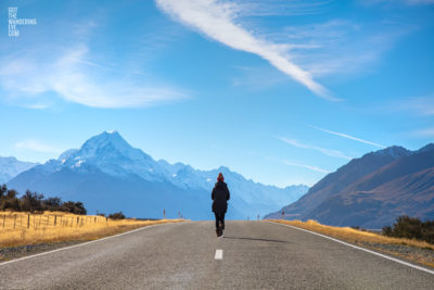 Woman Hiking towards Mount Cook National Park