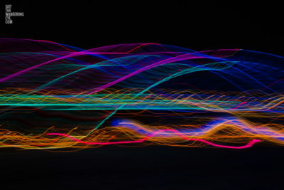 Long exposure, light painting photography of Vivid Festival. Light trails of Sydney Harbour Bridge, Australia