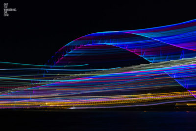 Long exposure, light painting photography of Vivid Festival. Light trails of Sydney Harbour Bridge, Australia