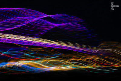 Long exposure, light painting photography of Vivid Festival. Light trails of Sydney Harbour Bridge, Australia