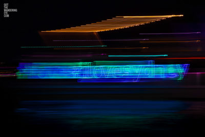 Long exposure, light painting photography of Vivid Festival. Light trails of Sydney Harbour, Australia. I Love Sydney