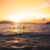 Fine Art Photography Print. Spectacular golden sunset dipping into the ocean at Black Rock, Maui, Hawaii