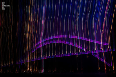 Long exposure, light painting photography of Vivid Festival. Light trails of Sydney Harbour Bridge, Australia