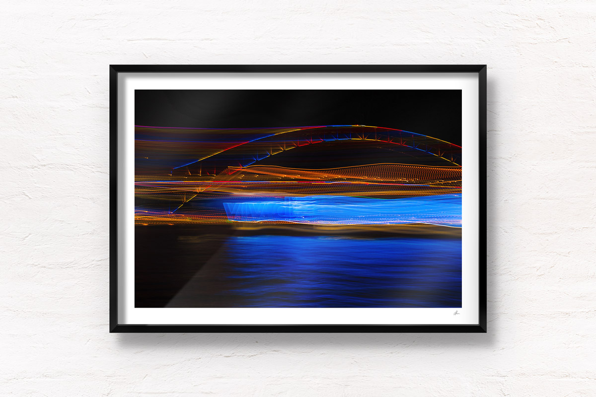 Long exposure, light painting photography of Vivid Festival. Light trails of Sydney Harbour Bridge, Australia