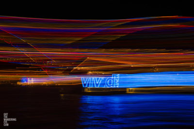 Long exposure, light painting photography of Vivid Festival. Light trails of Sydney Harbour Bridge, Australia