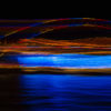 Long exposure, light painting photography of Vivid Festival. Light trails of Sydney Harbour Bridge, Australia. Vivid Sydney Harbour Bridge