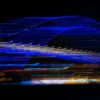 Long exposure, light painting photography of Vivid Festival. Light trails of Sydney Harbour Bridge, Australia