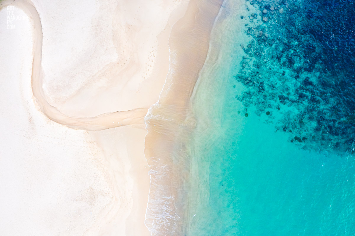 Aerial oceanscape above an empty clear Coogee Beach