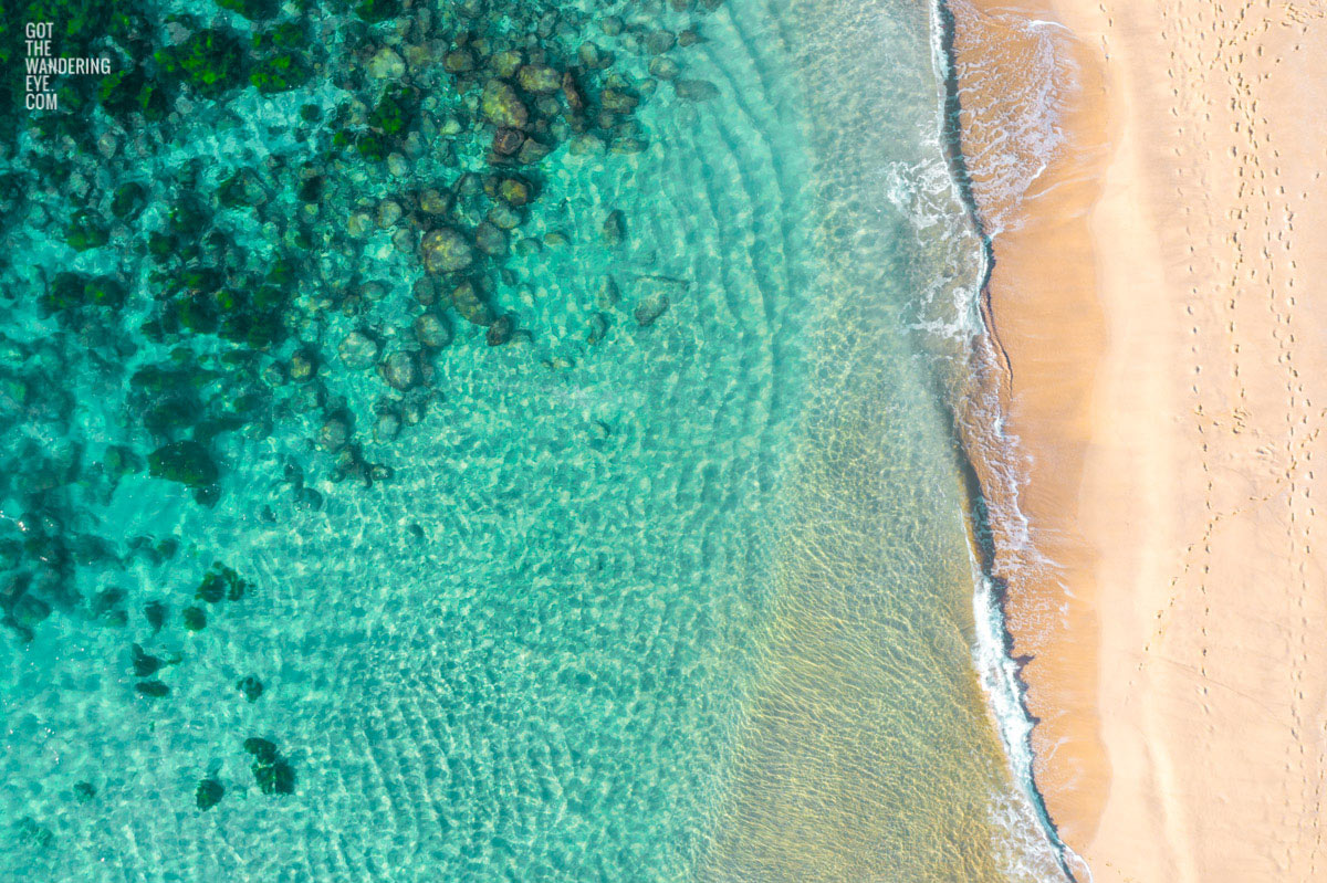 Aerial oceanscape above the Bogey Hole and turquoise waters of Bronte Beach. Clearwater Beach Sydney