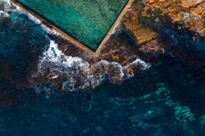 Aerial oceanscape of Wylies Baths Ocean Pool