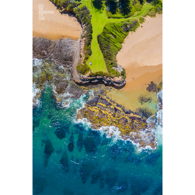 Aerial oceanscape above Austinmer, Bells Point headland.