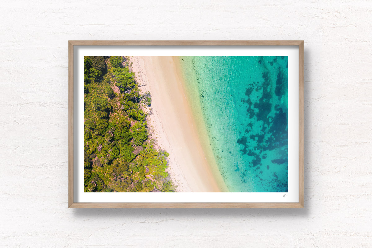 Aerial oceanscape overlooking Jibbon Beach in the South Coast of NSW