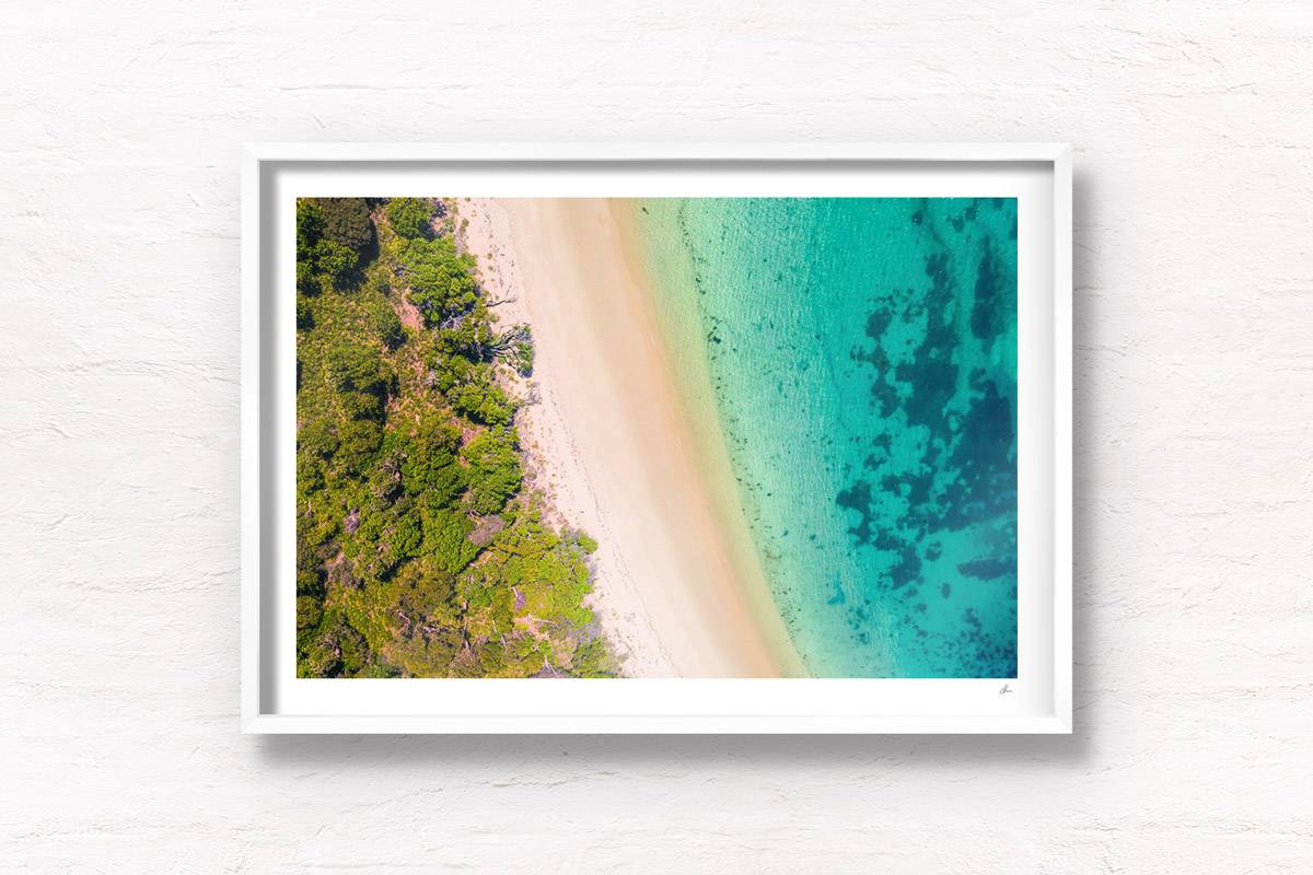 Aerial oceanscape overlooking Jibbon Beach in the South Coast of NSW
