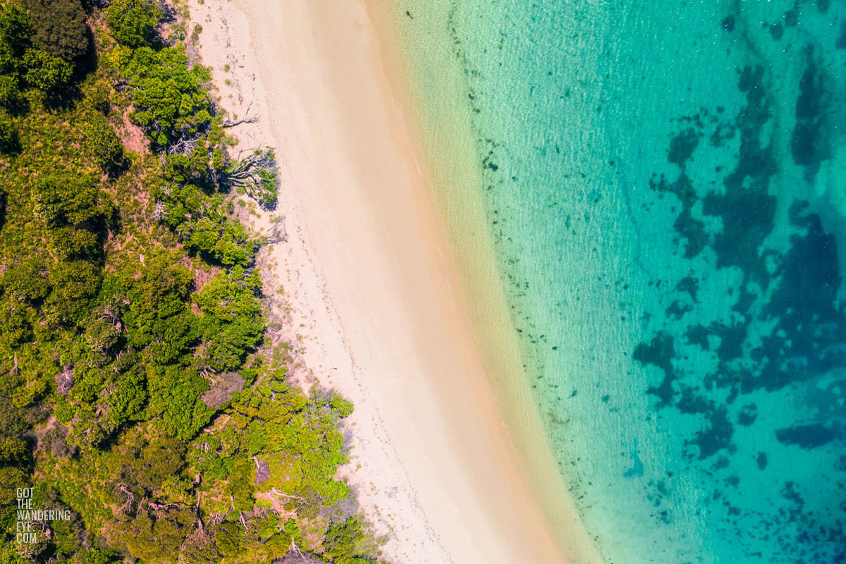 Aerial oceanscape overlooking Jibbon Beach in the South Coast of NSW