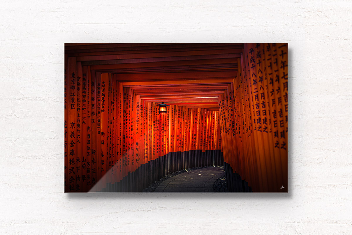 Red torii gates and lantern of Fushimi Inari Taisha Shrine in Kyoto. Fushimi Inari Taisha Shrine