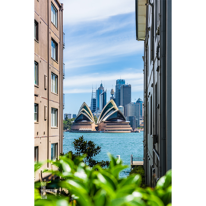 Looking through buildings to Sydney Harbour and Opera House