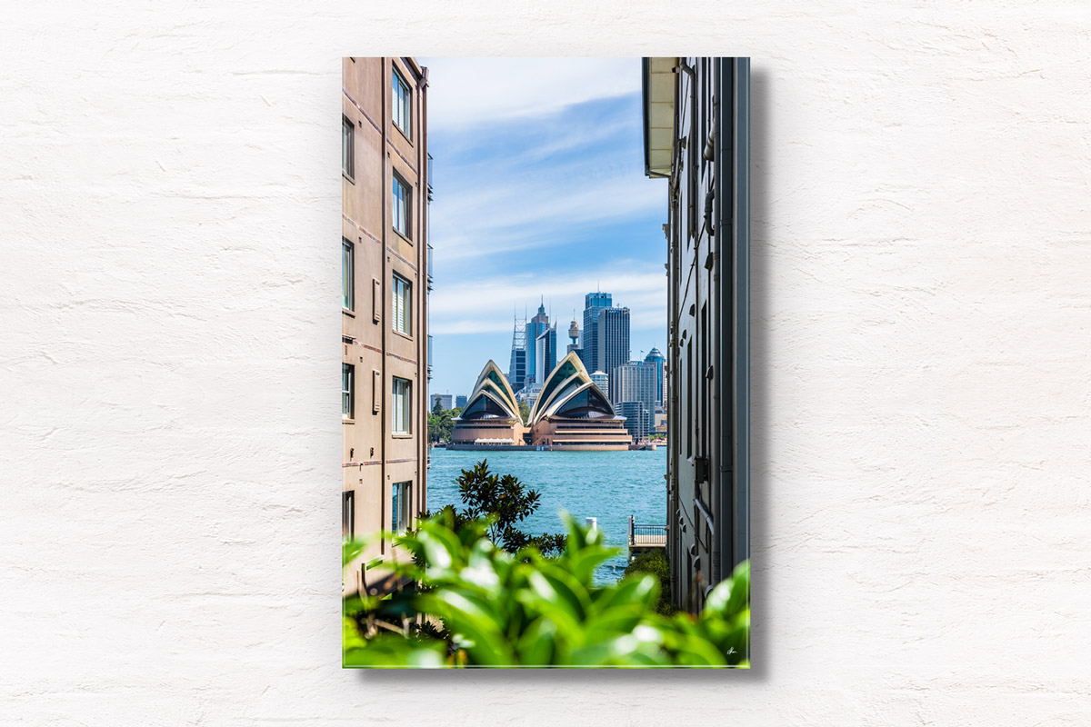 Looking through buildings to Sydney Harbour and Opera House