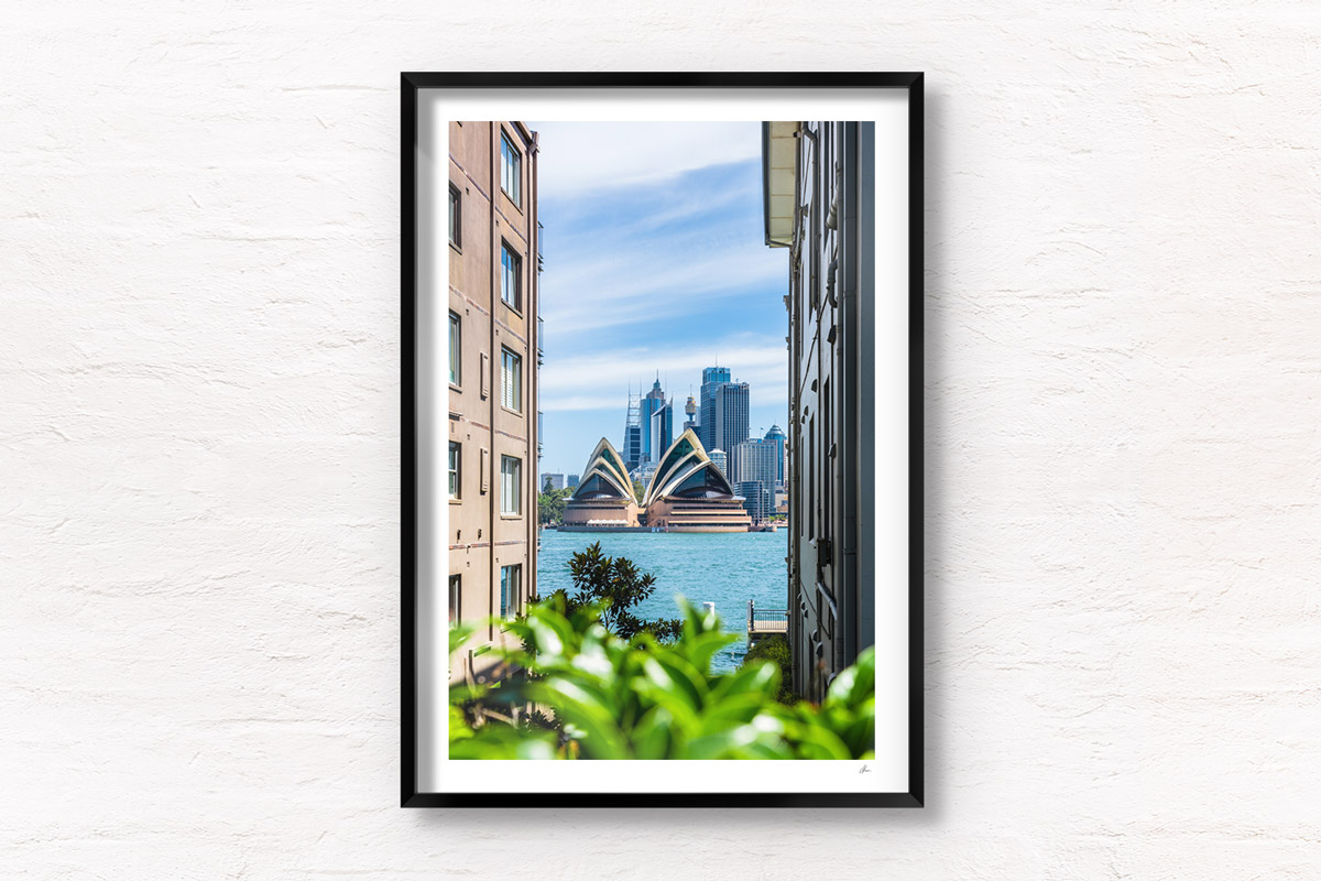 Looking through buildings to Sydney Harbour and Opera House